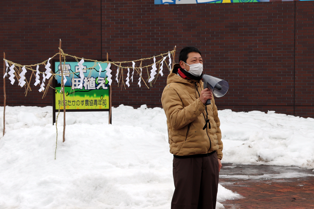 雪中田植え