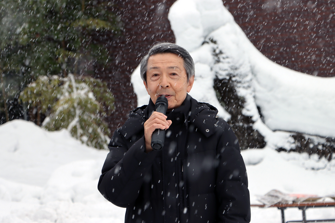 雪中田植え