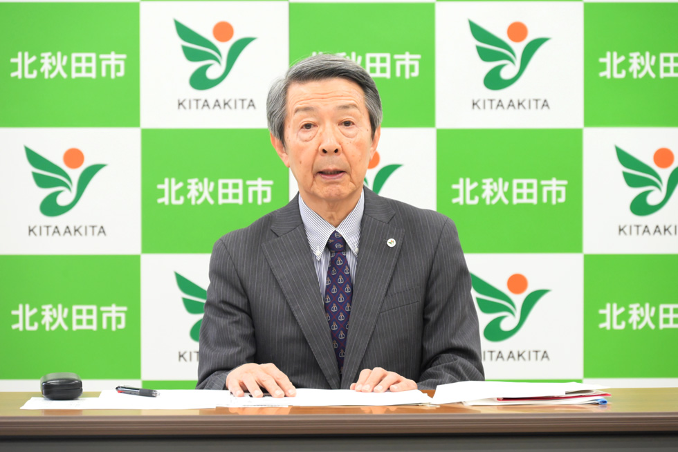 津谷市長