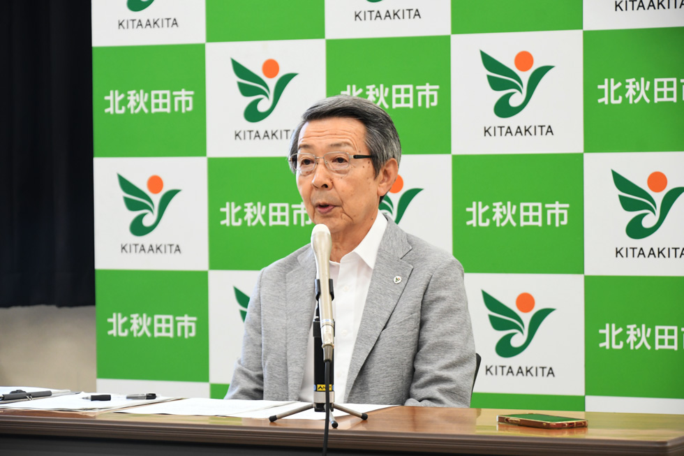 津谷市長