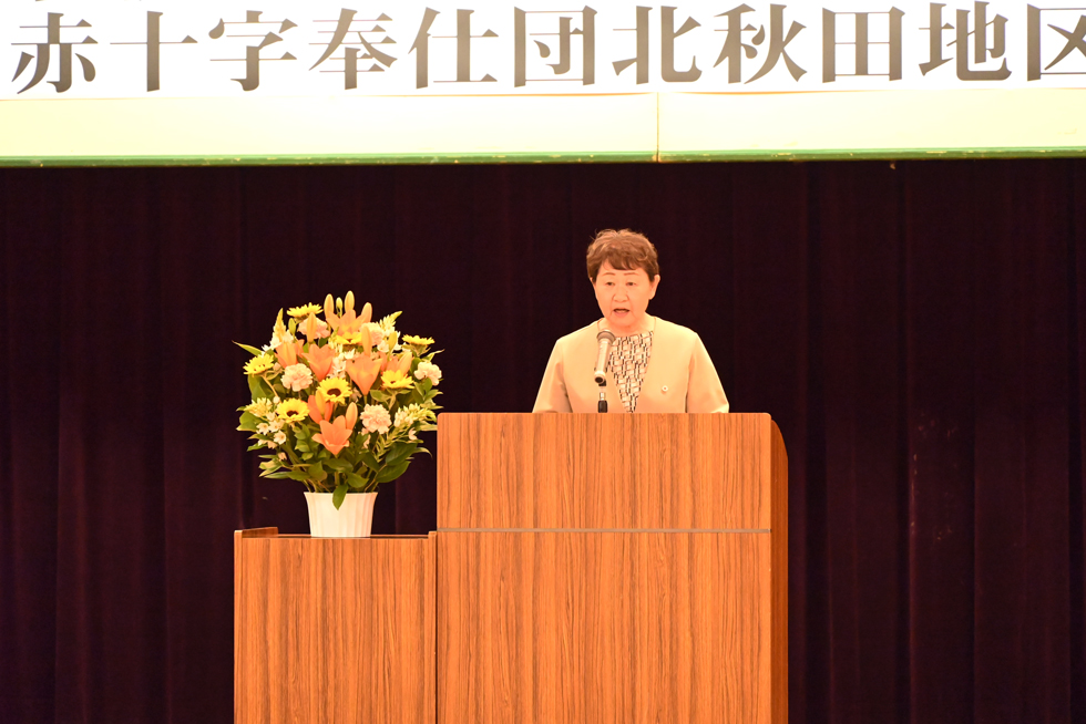 あいさつする松橋会長